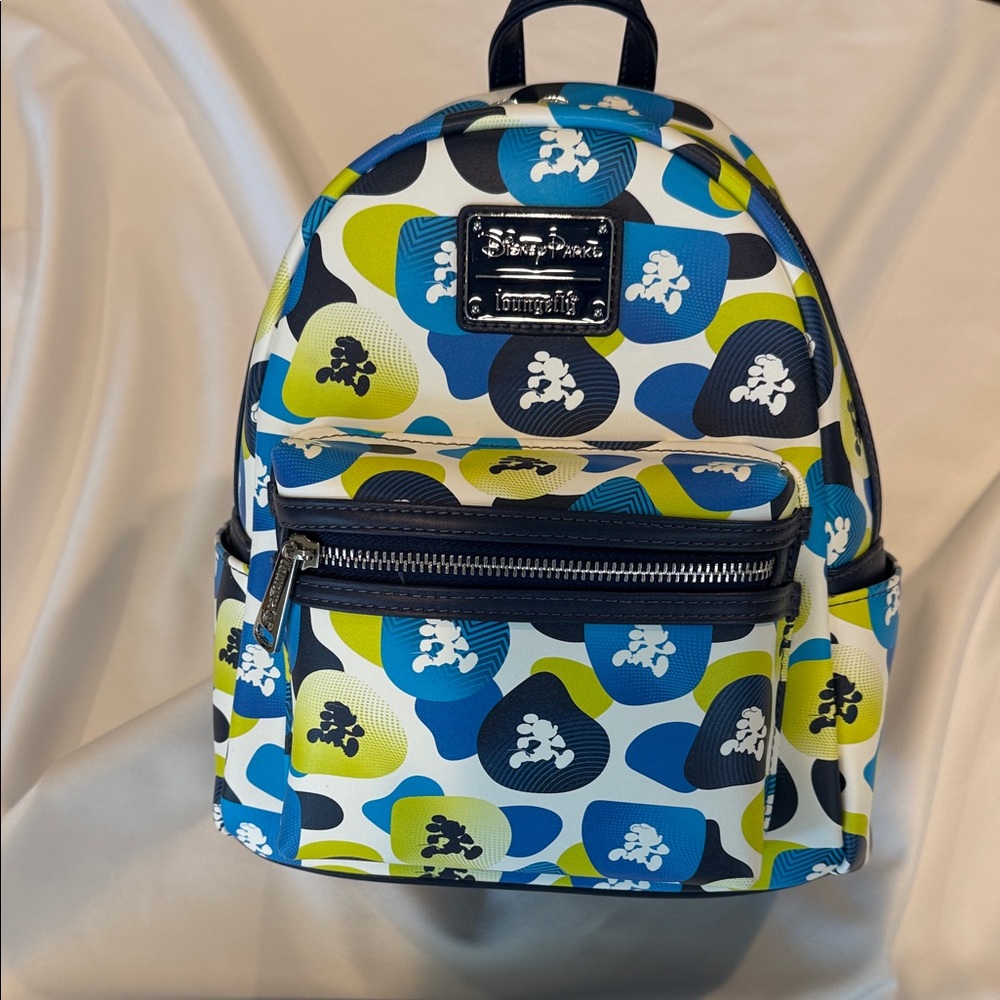 NWTs LOUNGEFLY Backpack with Blue and Green Design